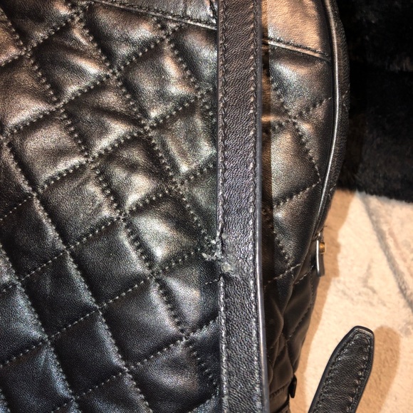 Black and gold Micheal Kors back pack